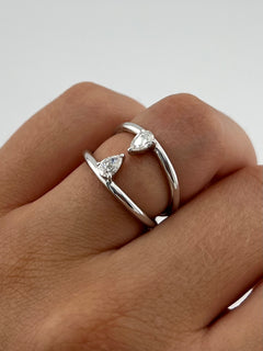 Ring With Two Lines And Two Pear Cut Diamonds