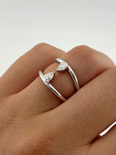 Ring With Two Lines And Two Pear Cut Diamonds
