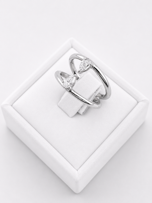 Ring With Two Lines And Two Pear Cut Diamonds